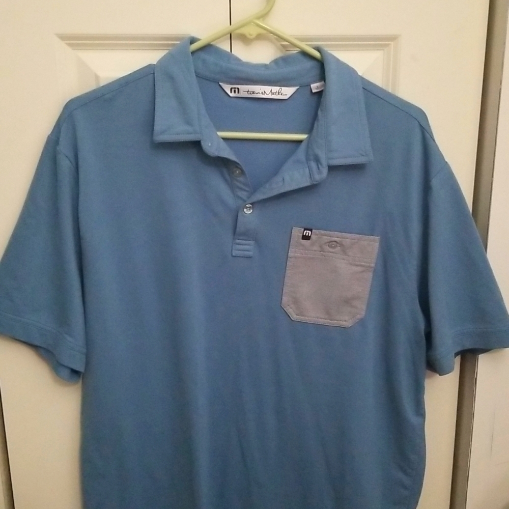 Travis Mathew blue polo size Large
